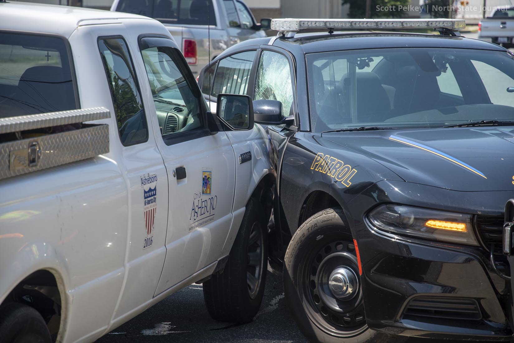 Sheriff's Office Patrol Car and City Vehicle Crash in Asheboro