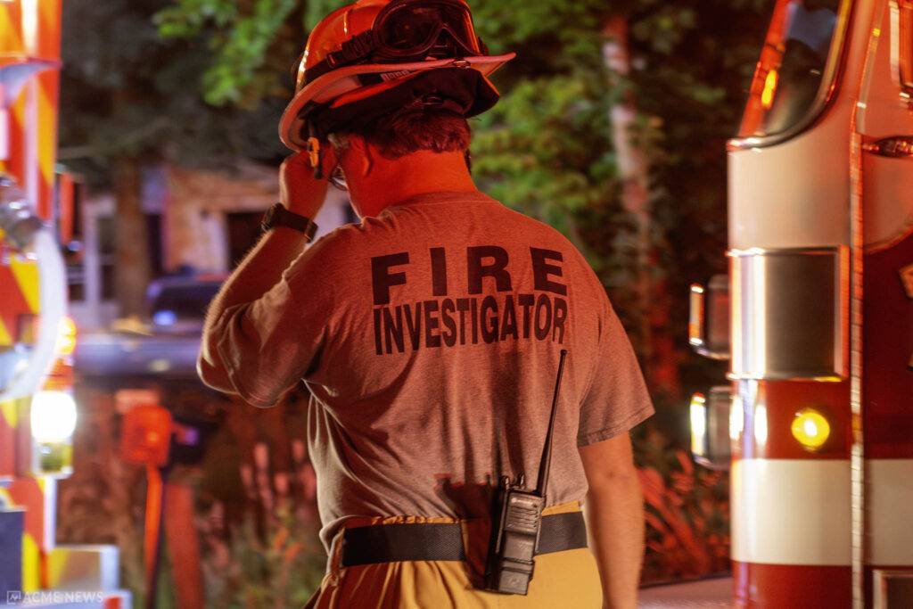 Fire Investigator (Acme News Archive)